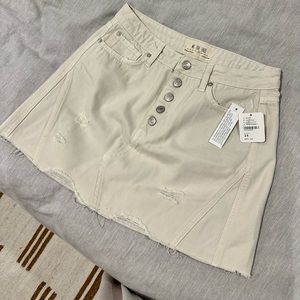 Free People Denim Mini Skirt in Cream. New with tags.